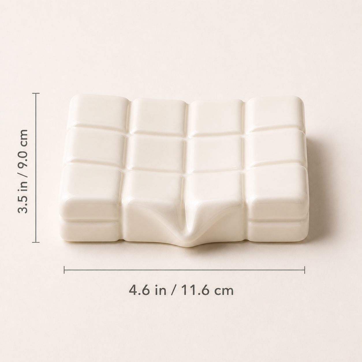 Glossy milk ceramic soap dish measuring 4.6 by 3.5 inches (11.6 by 9 centimeters)