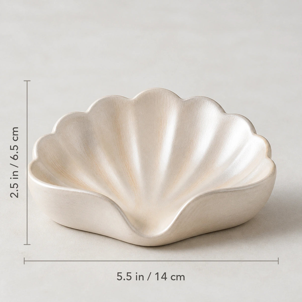 Champagne gold shell soap dish measuring 5.5 inches wide by 2.5 inches high