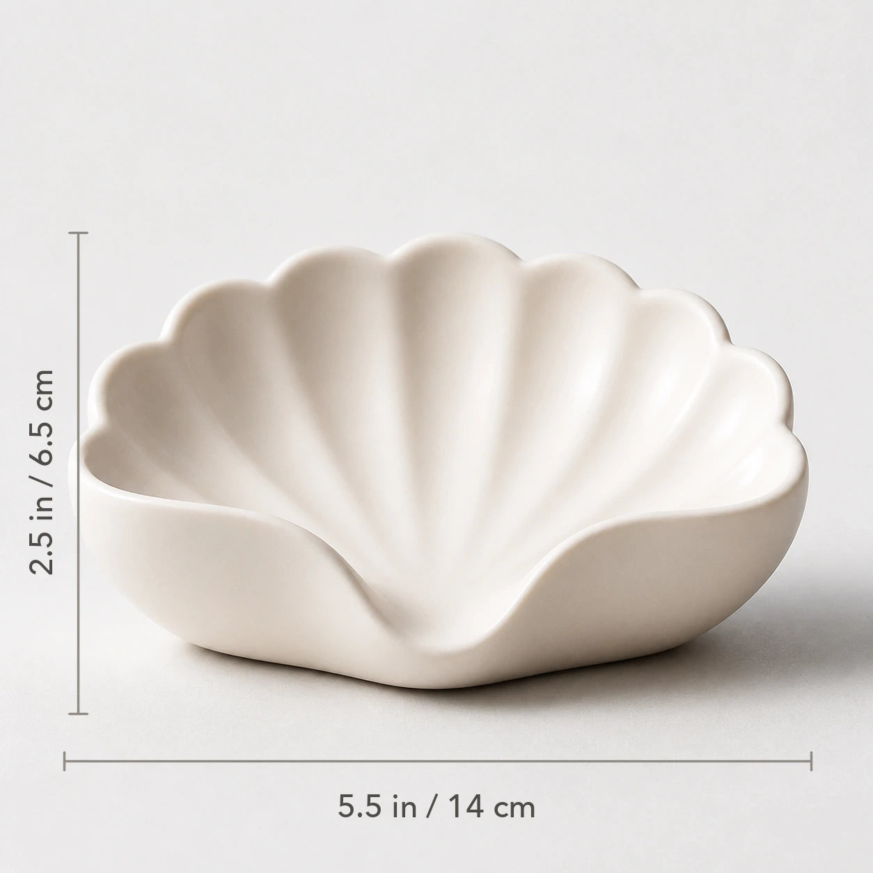 Pearl white shell soap dish measuring 5.5 inches wide by 2.5 inches high