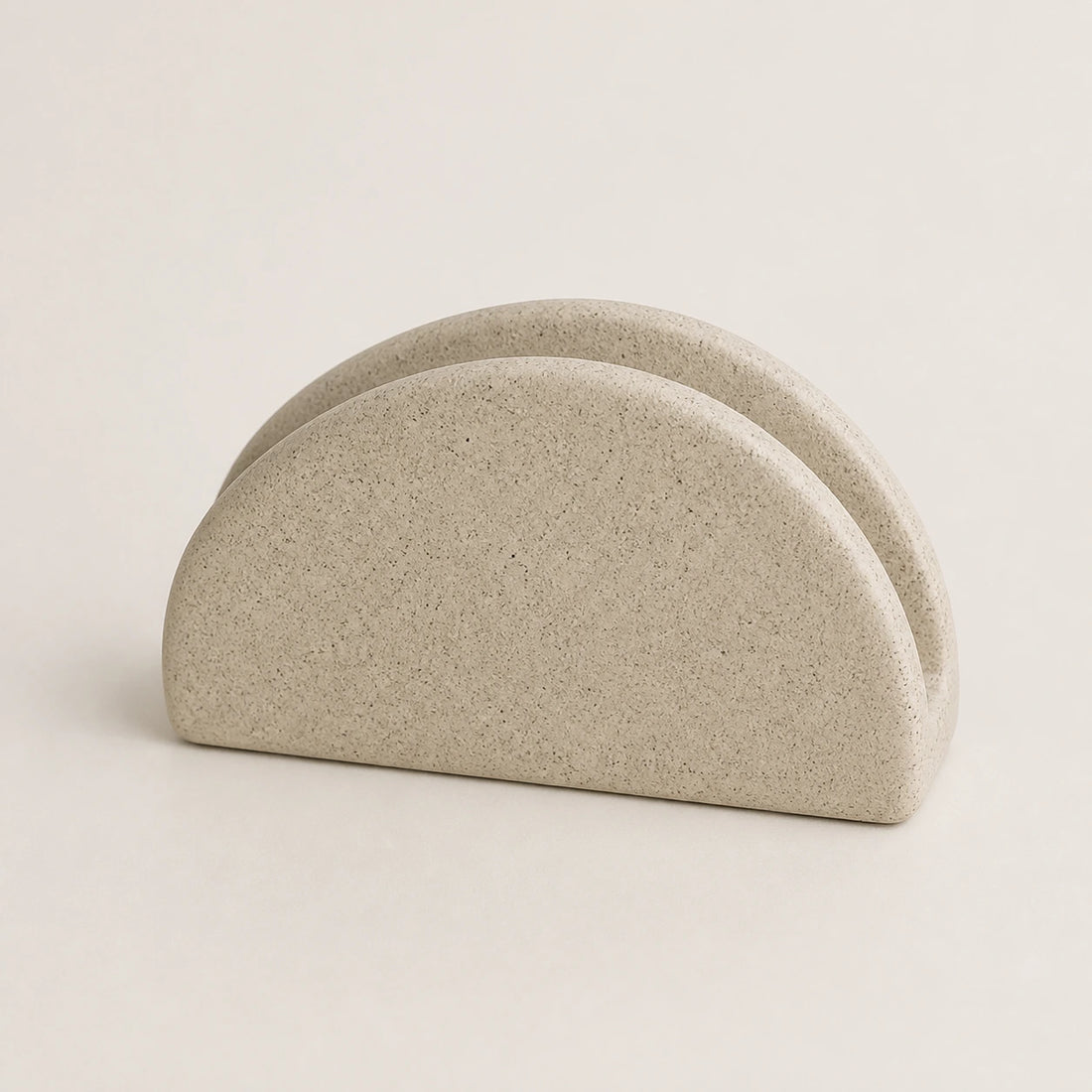 Sandstone-beige speckled ceramic napkin holder with two half-moon walls