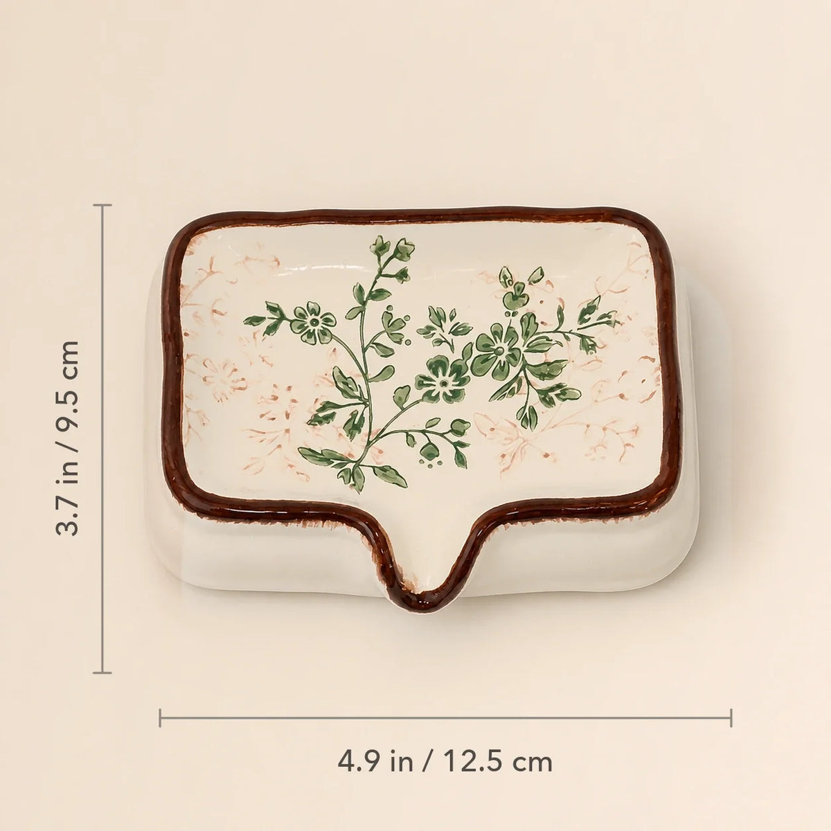 Botanical ceramic soap dish shown with 4.9 by 3.7 inch dimensions