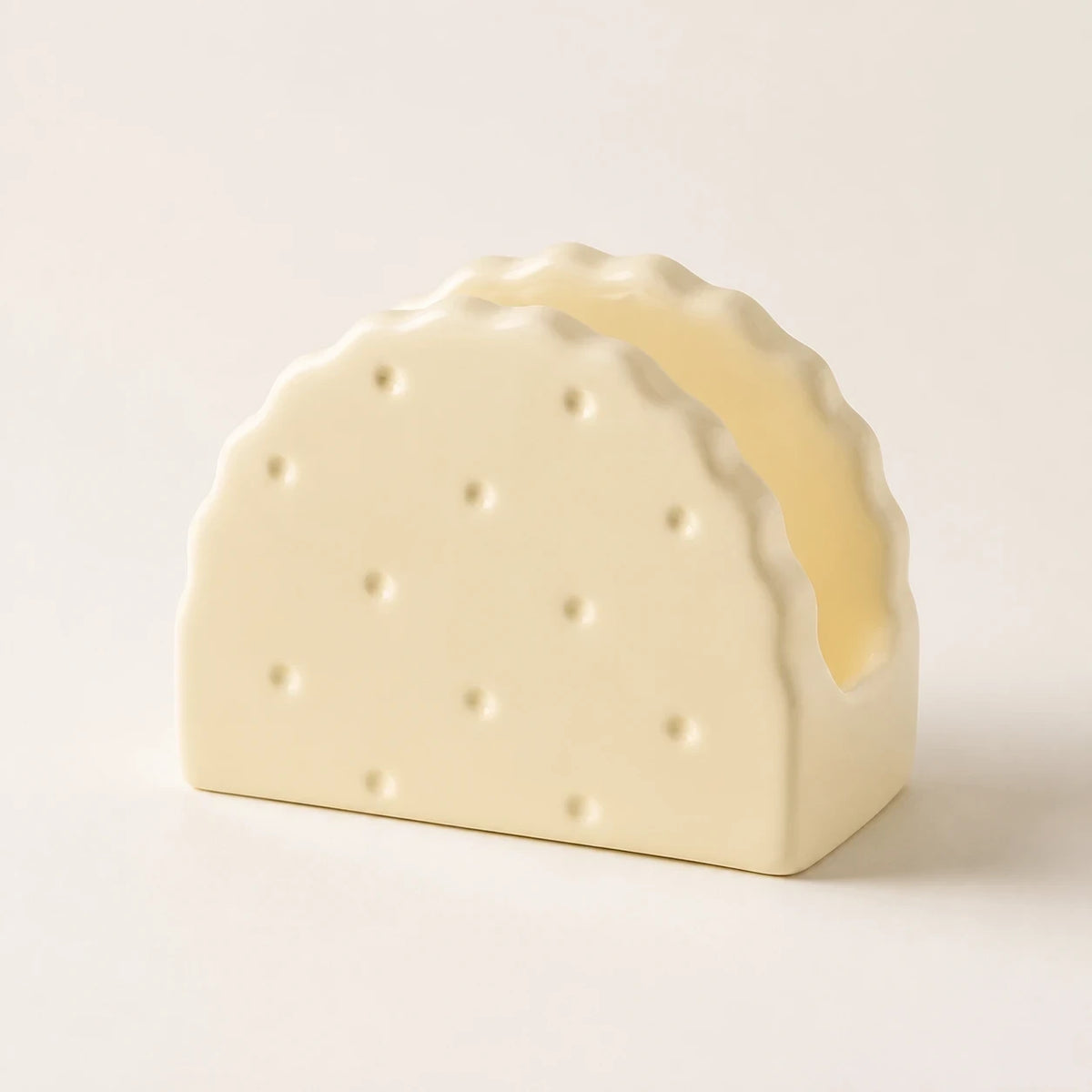 Butter Cream Soda Cracker ceramic napkin holder with scalloped edges
