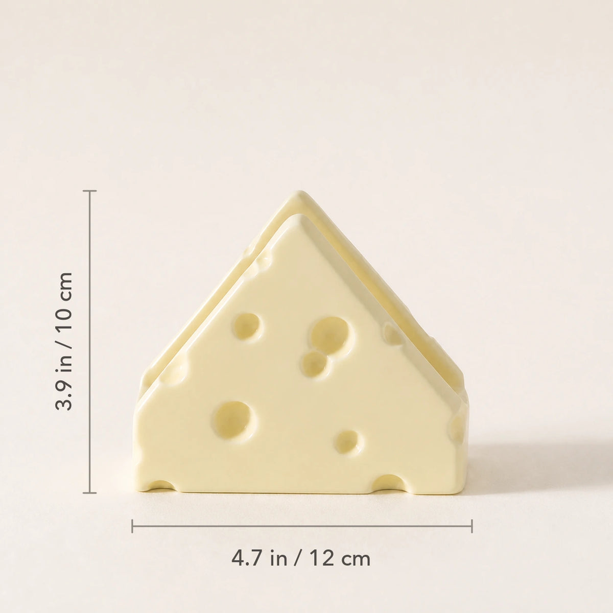 Swiss Cheese Butter Cream ceramic napkin holder marked 4.7 inches wide and 3.9 inches high